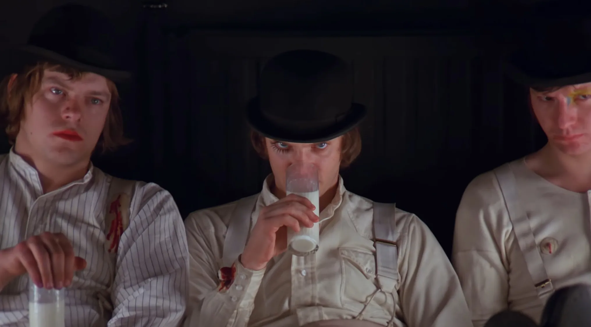 Opening Movie Scenes: Alex DeLarge drinks milk with his droogs in this film's opening scene.