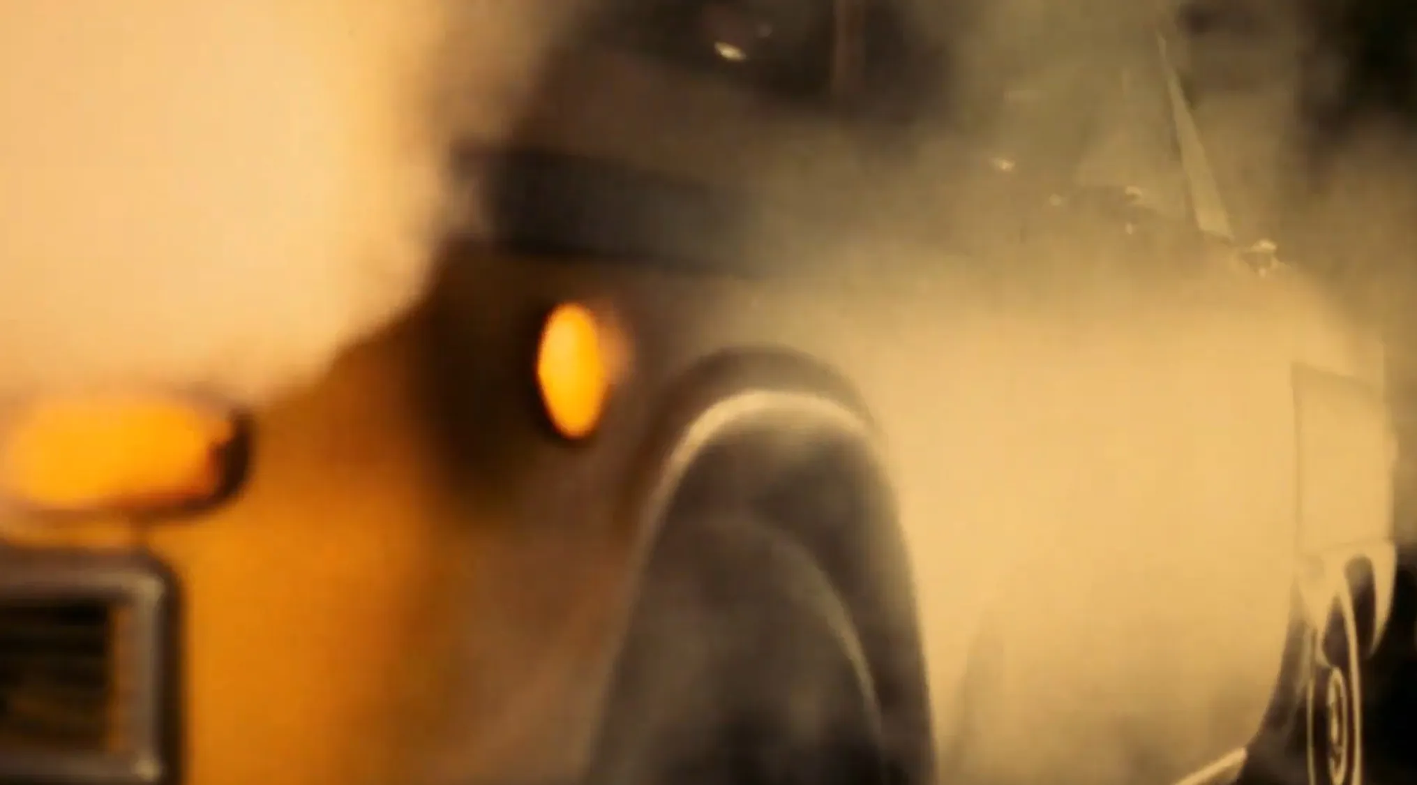Opening movie scenes: A yellow taxi cab shrouded in steam on a gritty Manhattan street.