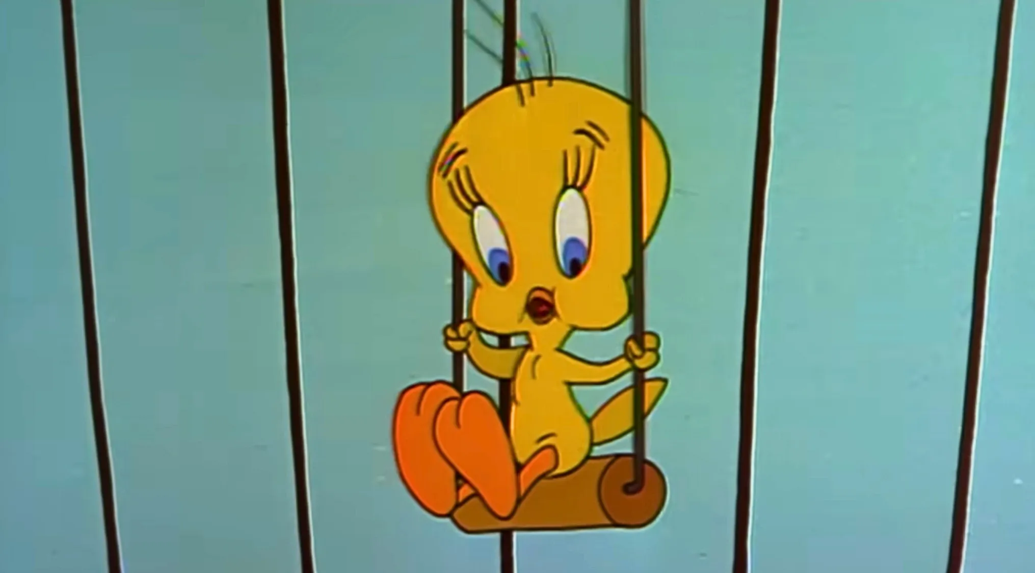 A charming image of Tweety Bird on a swing, a character from Saturday Morning Cartoon Trivia.