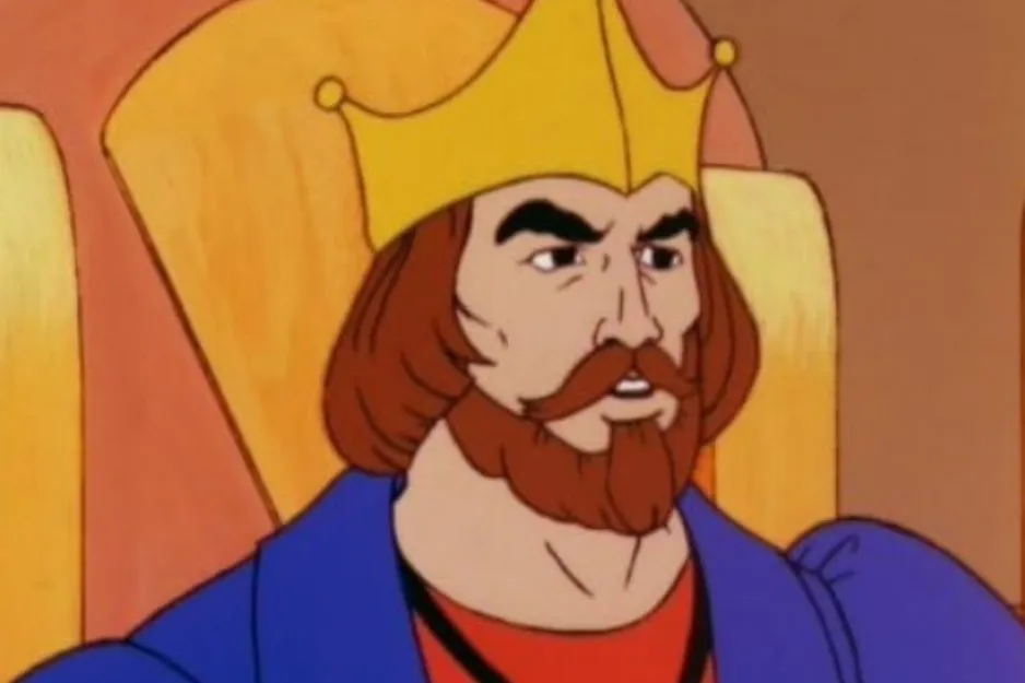 A character with a red beard and a gold crown, seated on a throne, a potential nemesis to He-Man.