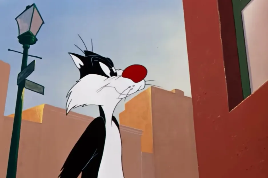 Sylvester the cat, ultimate nemesis of Tweety Bird, looking determined on a city street.