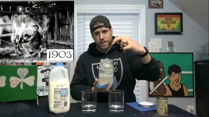 A man demonstrating milk preparation with a historical image from 1903, comparing modern and past facts.