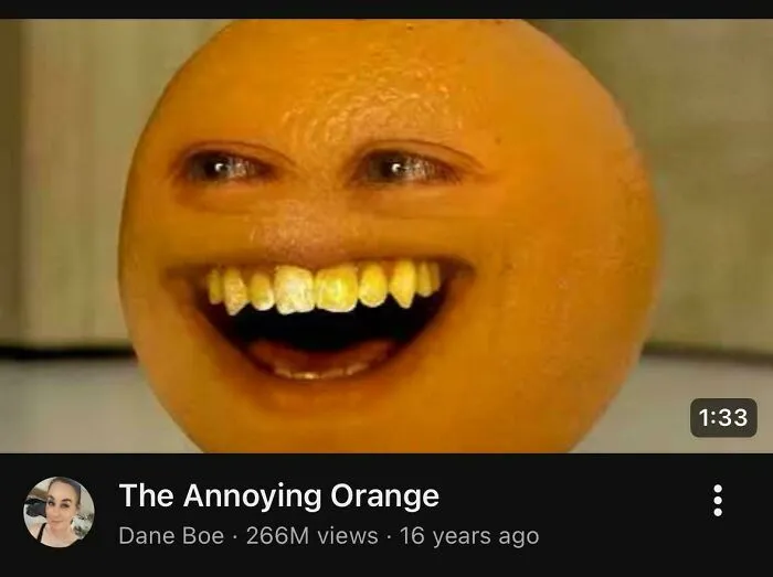The Annoying Orange character with a wide, grinning mouth, changing your sense of history through timeline facts.