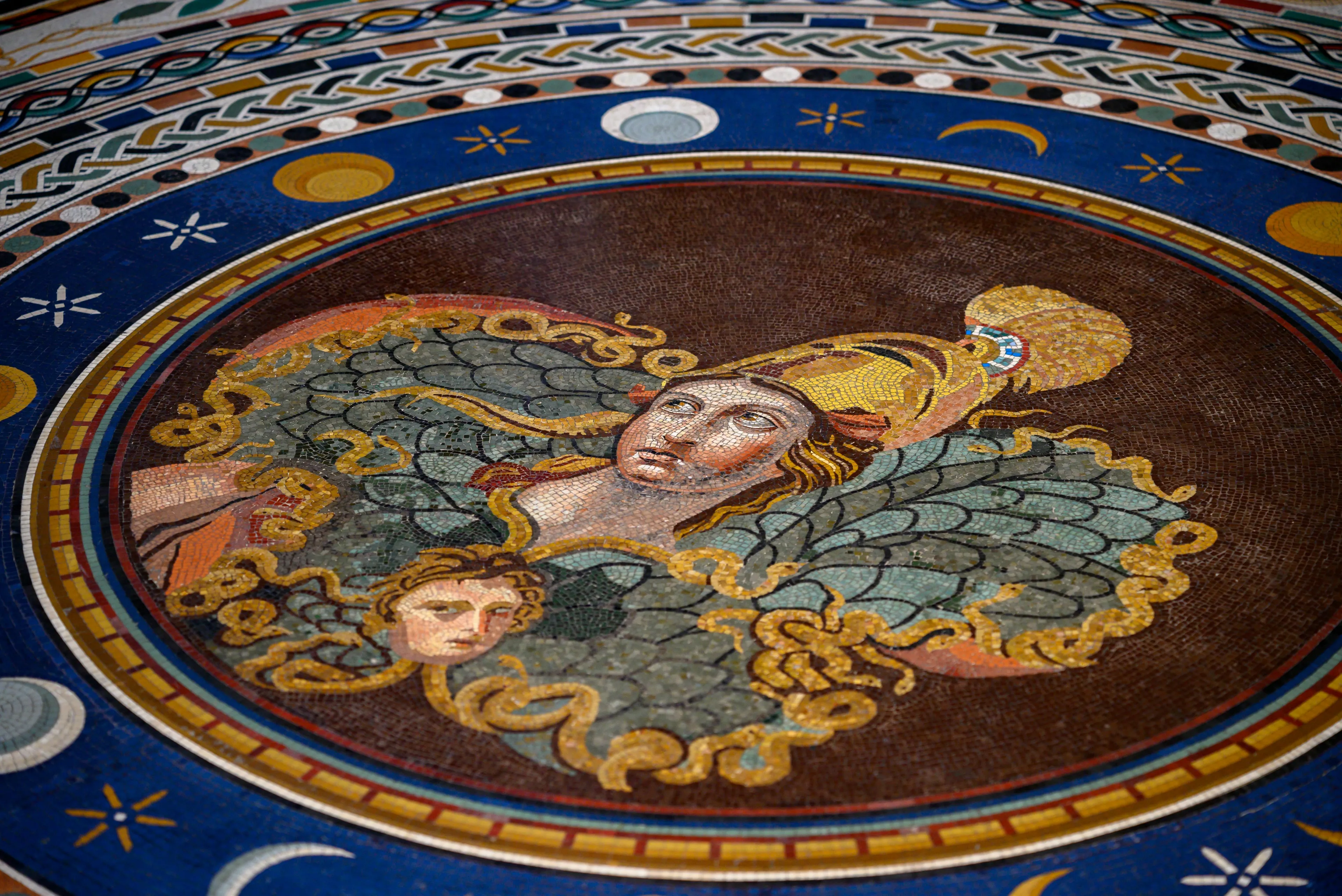 An ornate mosaic featuring a mythological figure, suitable for an odd one out general knowledge challenge.