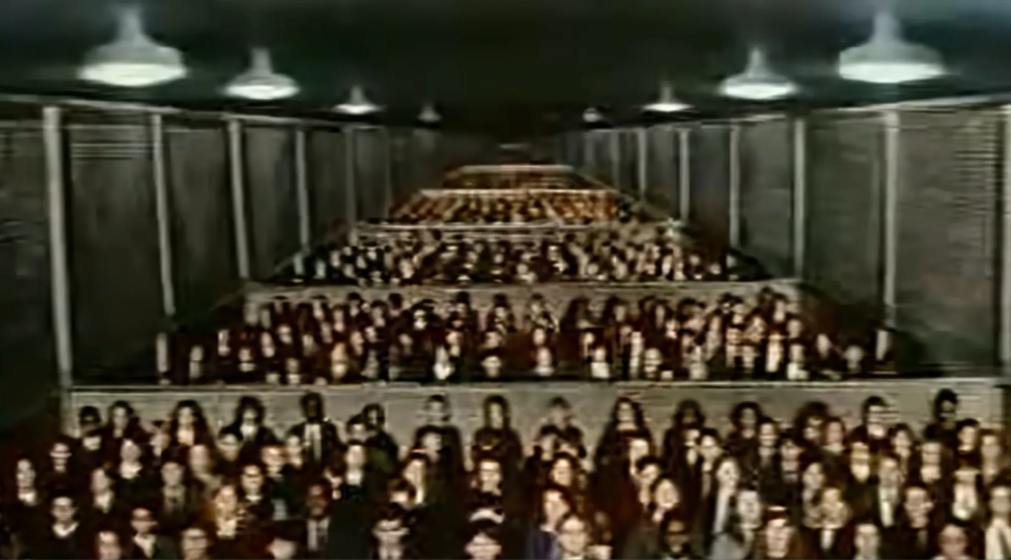 An iconic music video featuring a large group of people arranged in a pyramid.