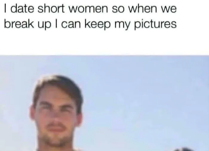 A dating meme showing a man looking serious with only the top half of a woman visible next to him, illustrating a joke about short women.