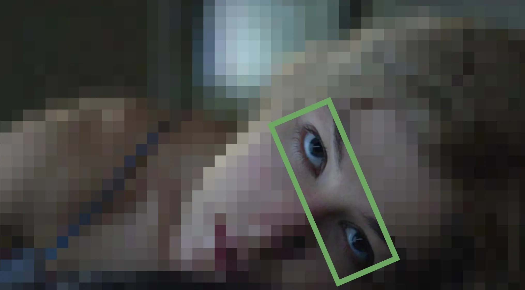 Pixelated image with a green box highlighting a woman's eyes from a film, for a Guess The Movie game.