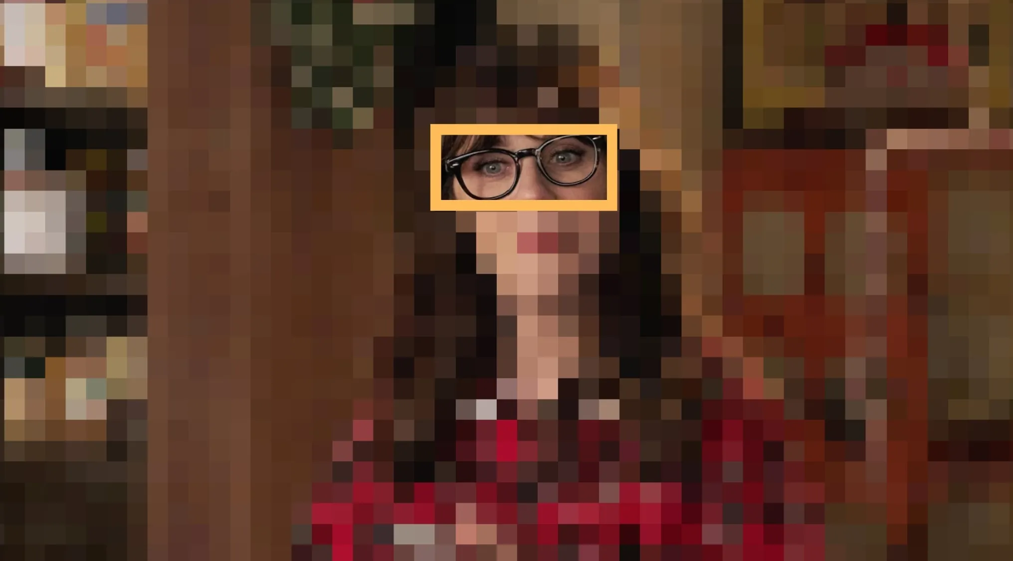 Pixelated image with a focus on a woman's eyes wearing glasses, prompting to guess the TV show.