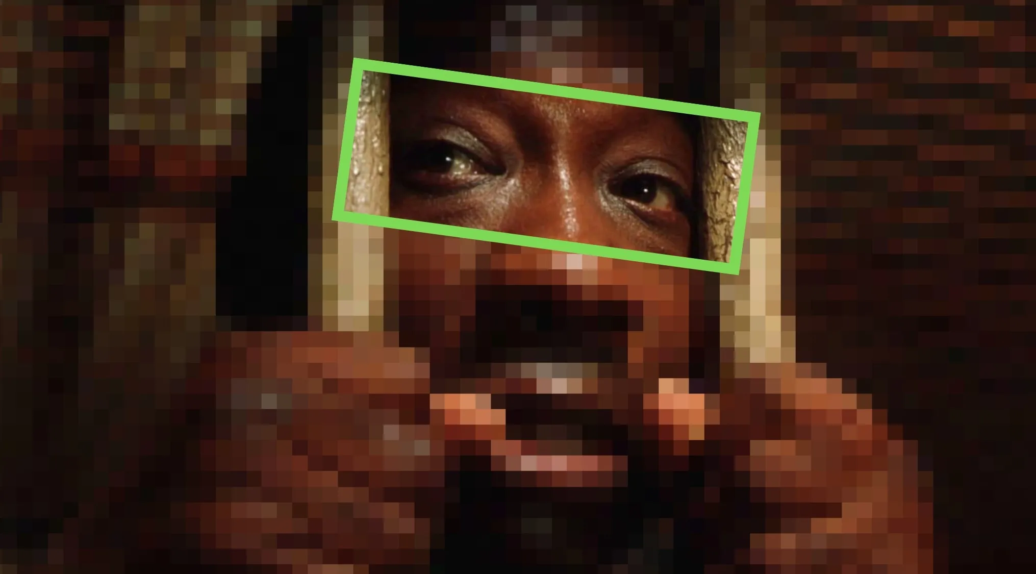 Close-up of pixelated eyes in a film, asking viewers to spot the film from the eyes.