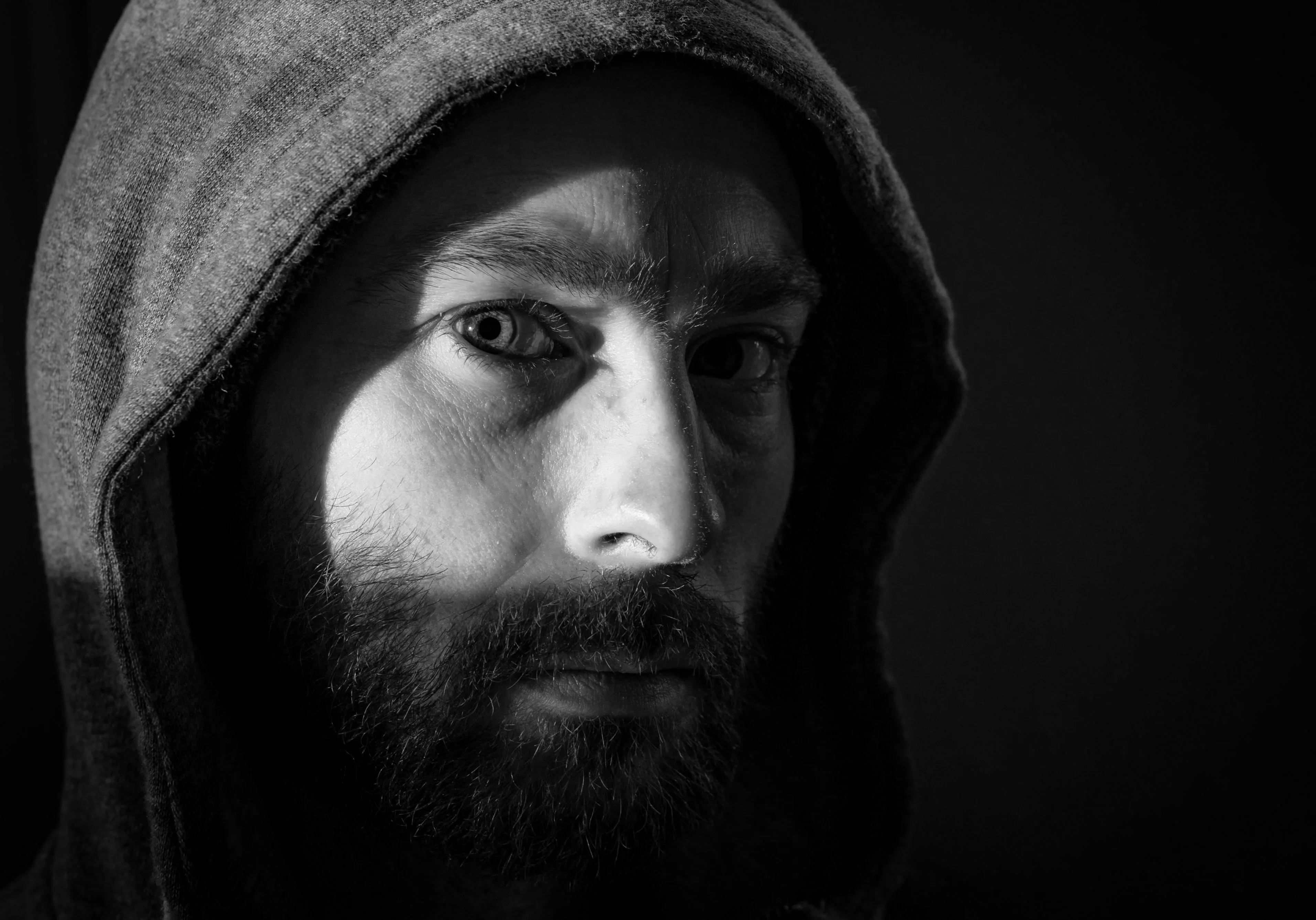A hooded stranger appears, ready to send you on a mythological quest.