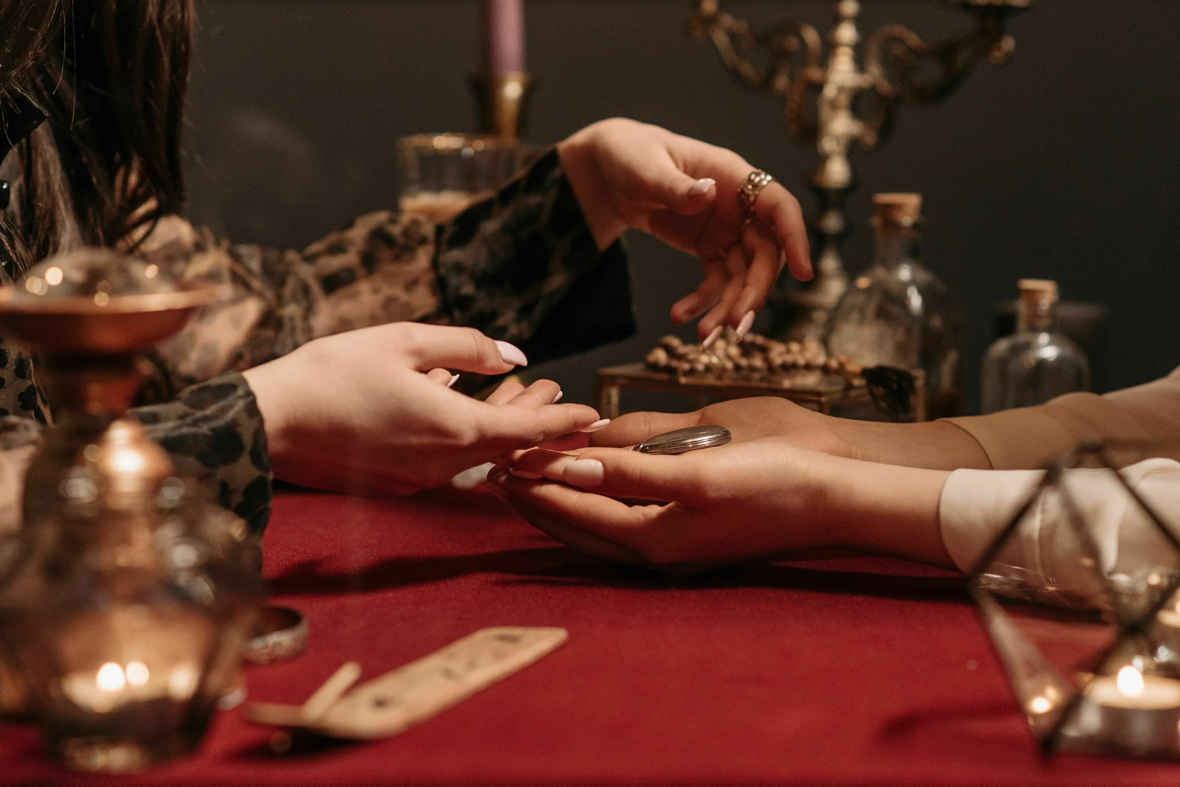 An oracle's hands give a cryptic prophecy, guiding a mythological quest.