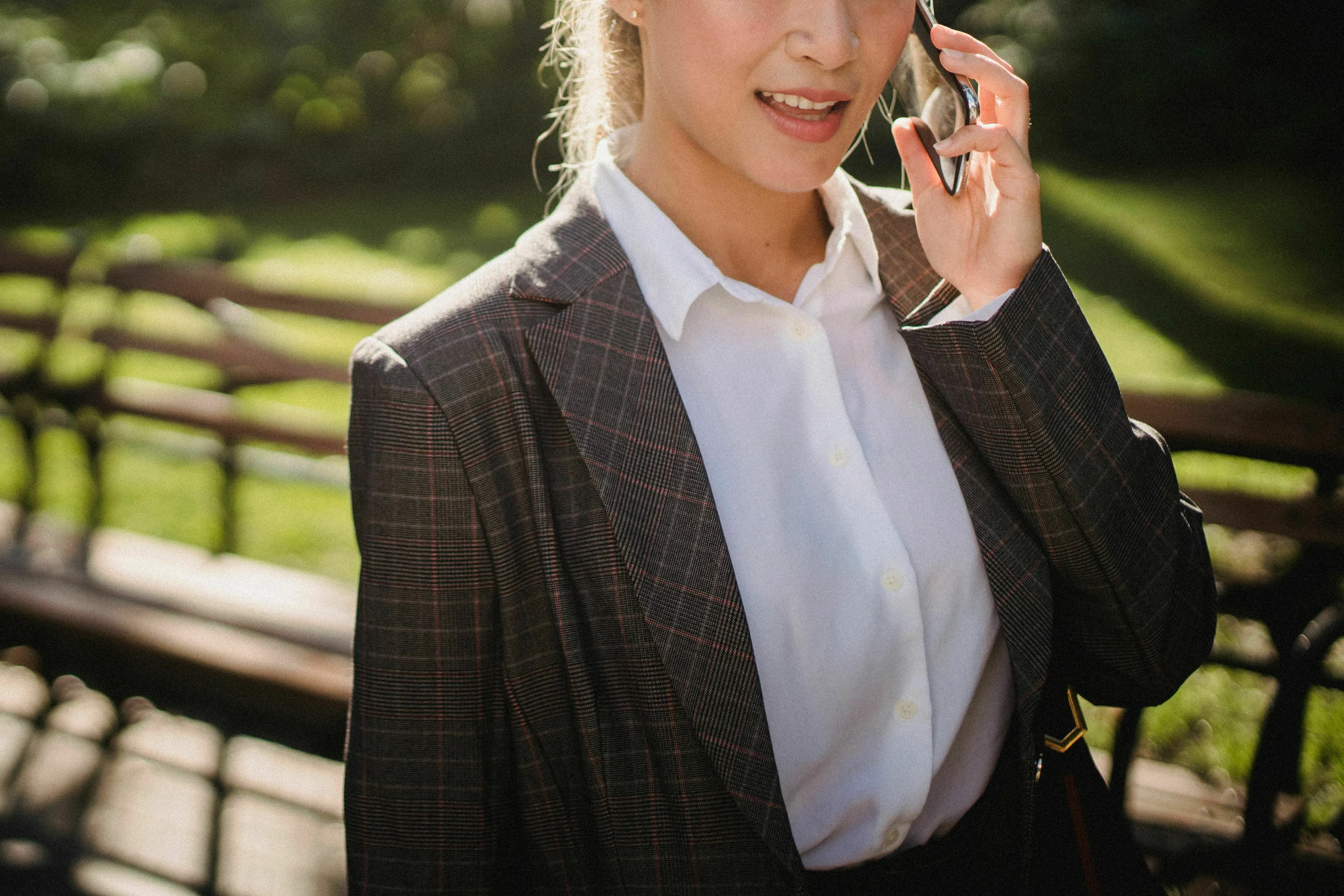 Woman on phone, realizing she's talked too much about herself, a green flag scenario.