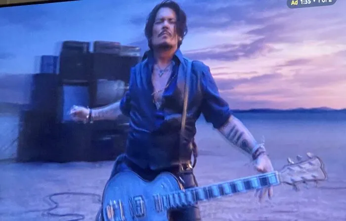 Johnny Depp Strumming A Guitar In The Desert For Dior. Irritates Soooo Much