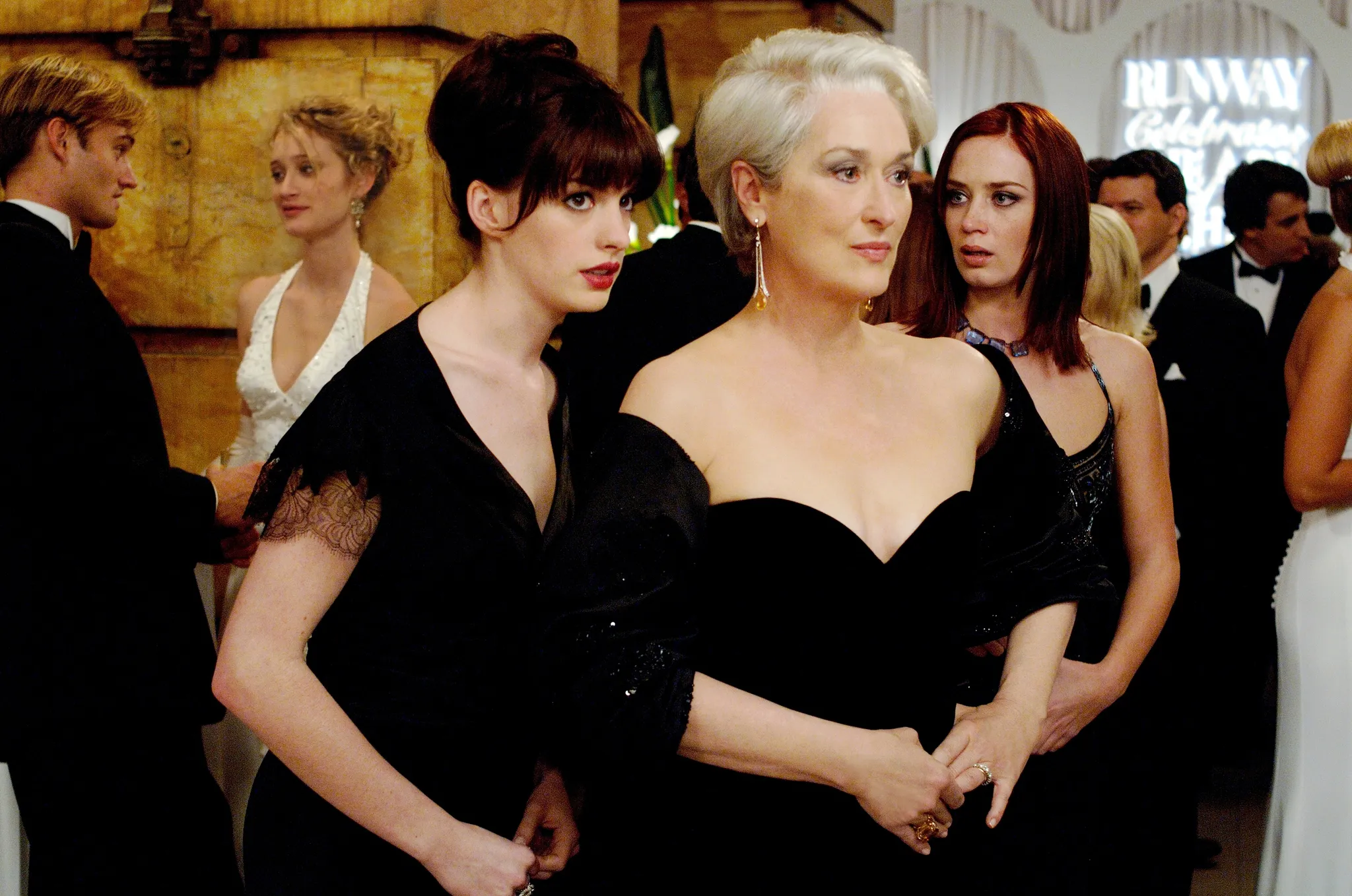 Meryl Streep and Anne Hathaway in a scene from The Devil Wears Prada, attending an event on a lazy Sunday.