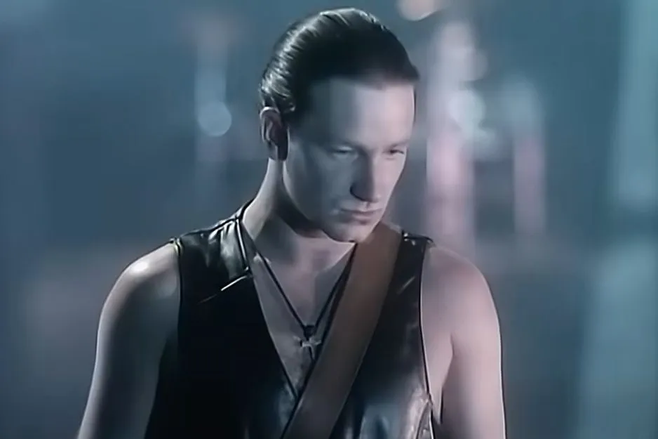 U2's With or Without You: Bono from U2, with a serious expression, embodying a song that feels like life.