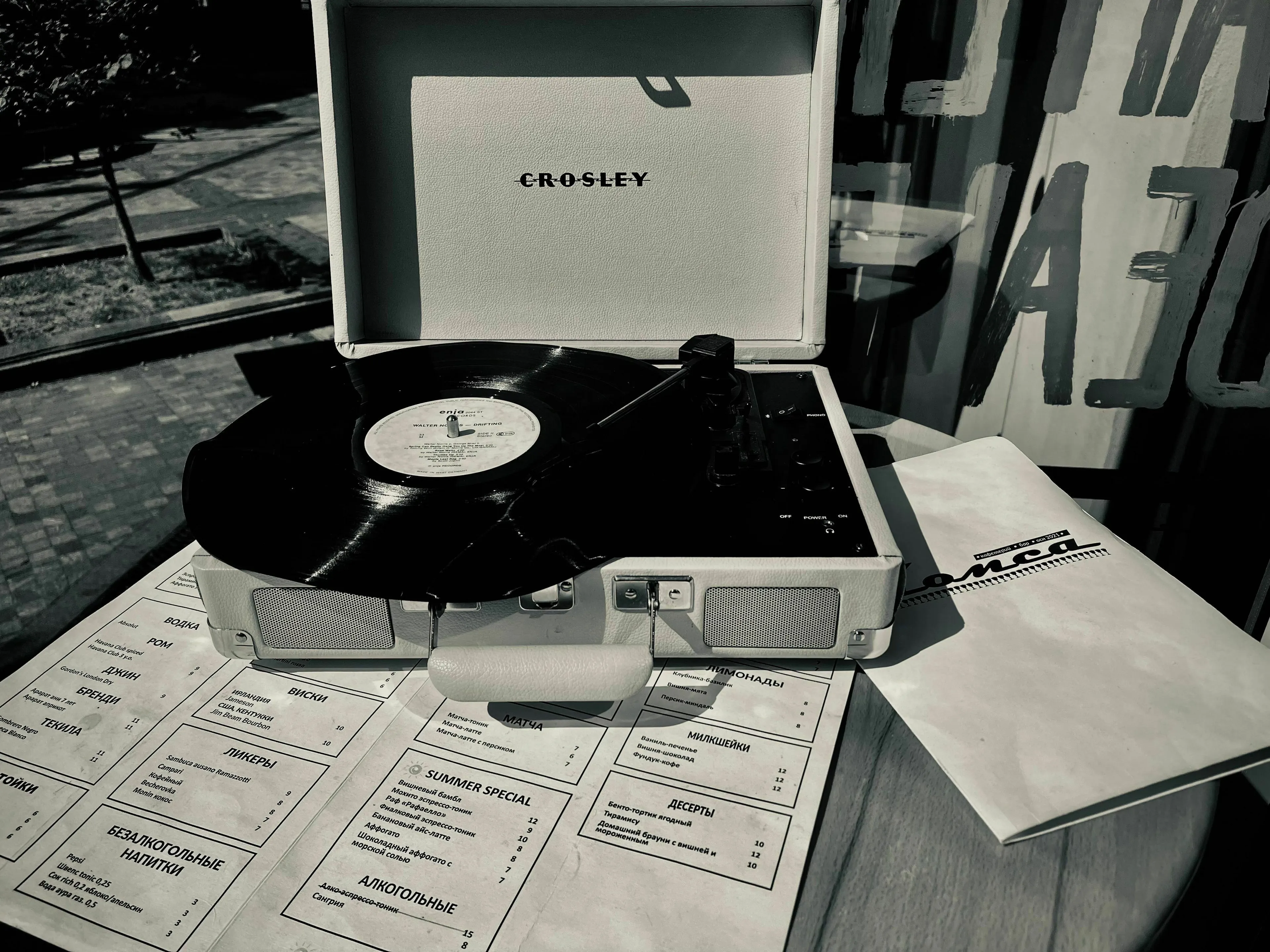 A retro Crosley record player with a vinyl album, reflecting on what draws you to a piece of music.