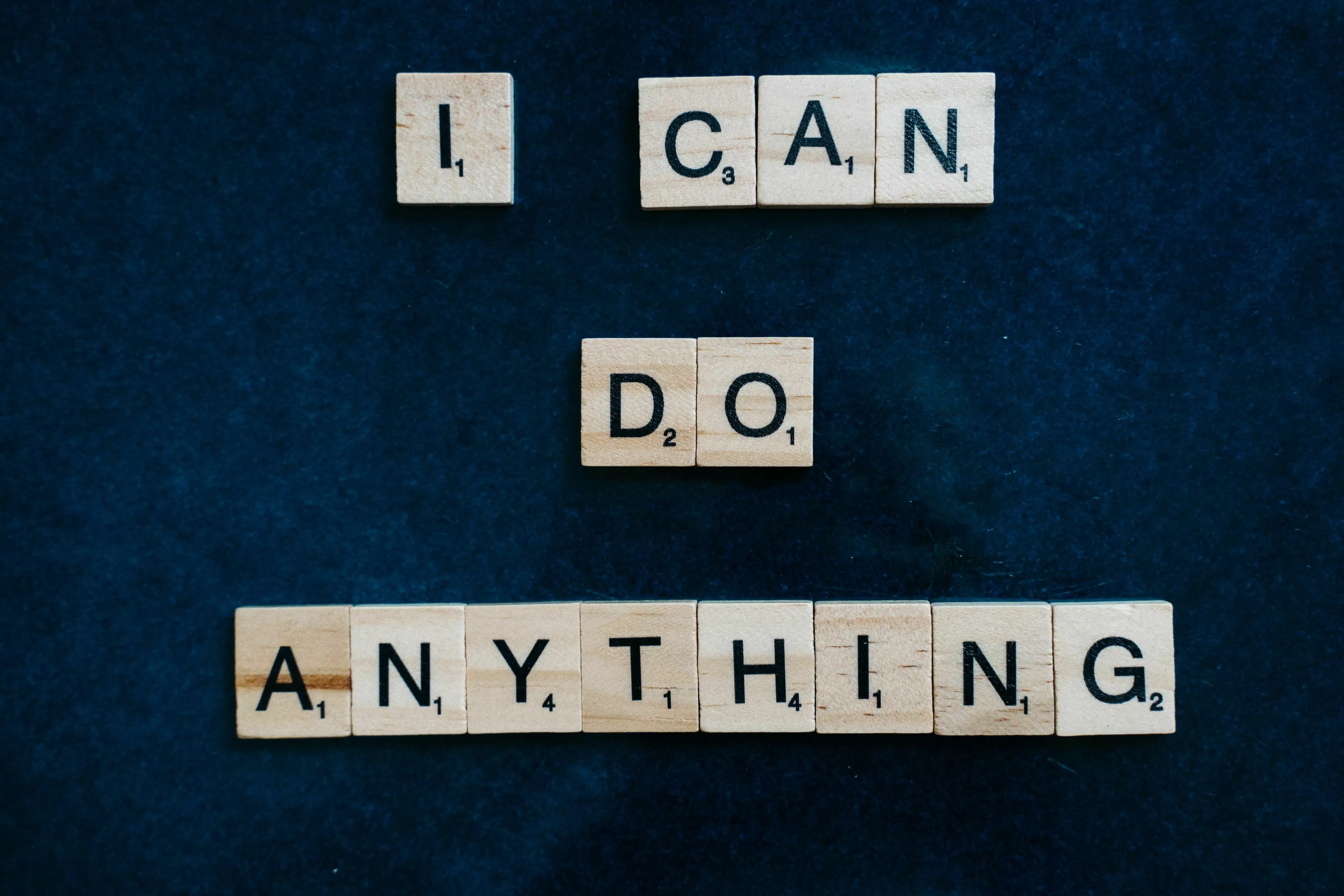 Historical figure represented by scrabble tiles spelling I CAN DO ANYTHING, reacting to a plan that cannot be done.