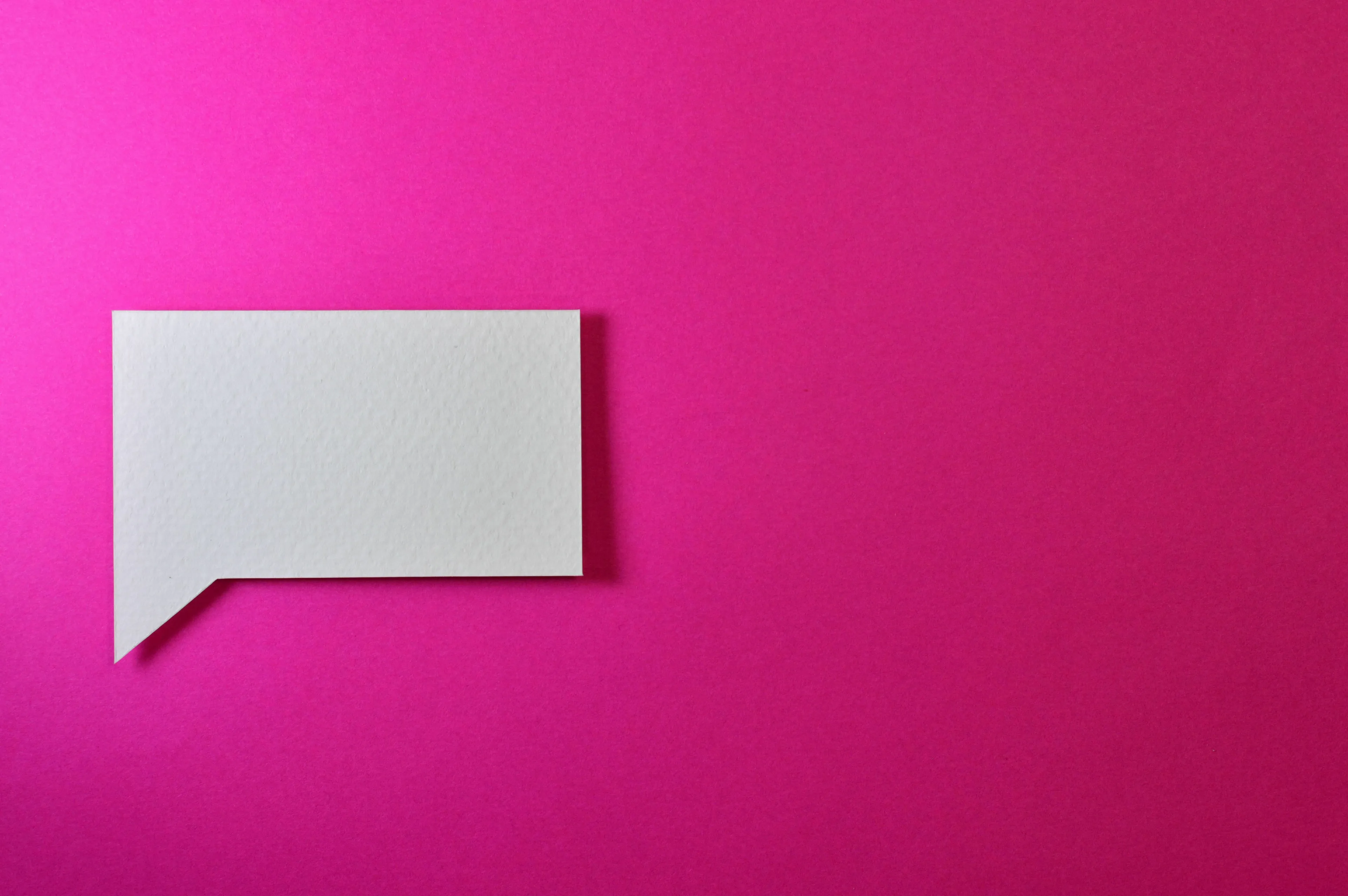A white speech bubble on a pink background for Historical Figure quiz: Pick the phrase that fits you best.
