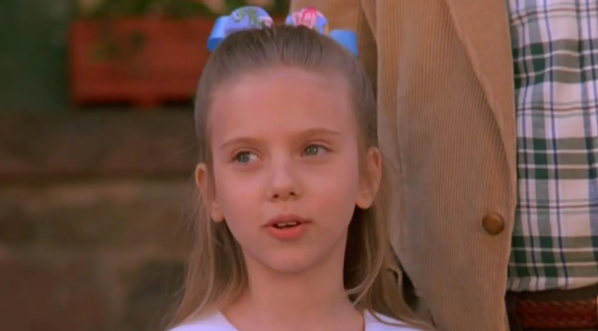 A young girl with blonde hair and pigtails, making her film debut, before the fame.