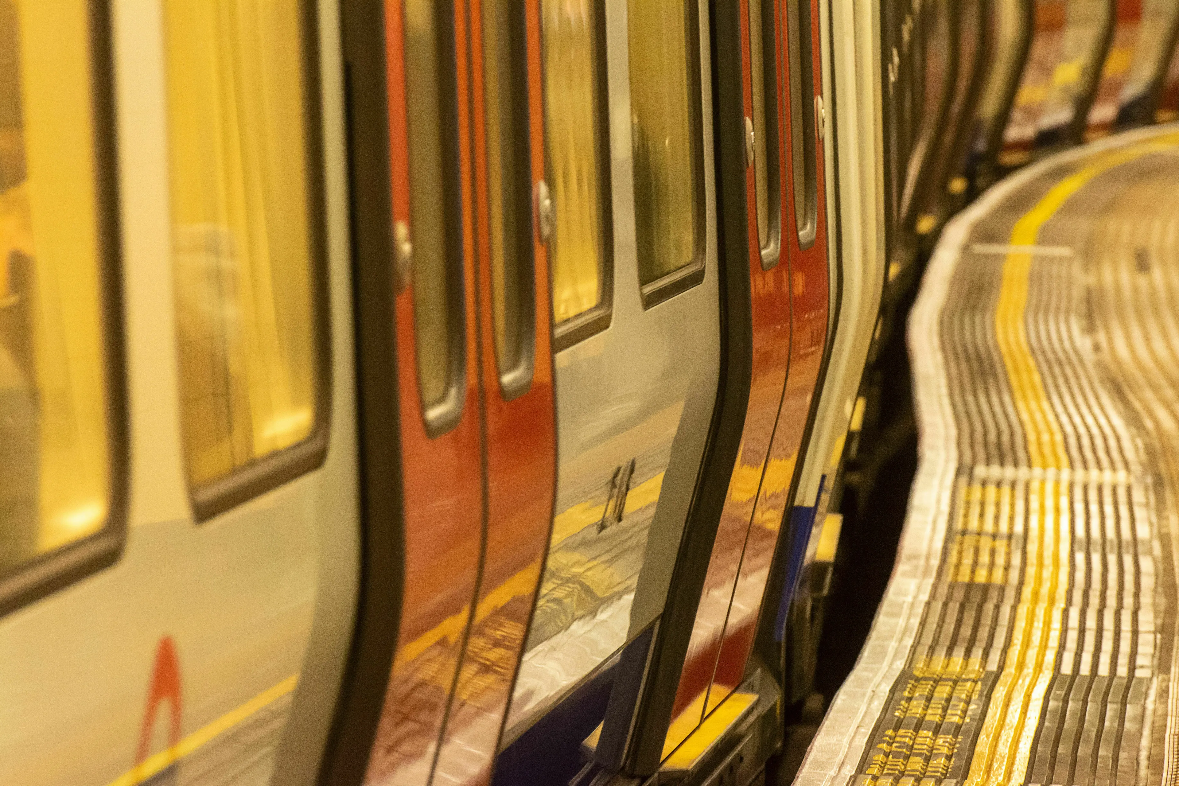 London underground rail system with a train at the platform, showing the famous underground in London.