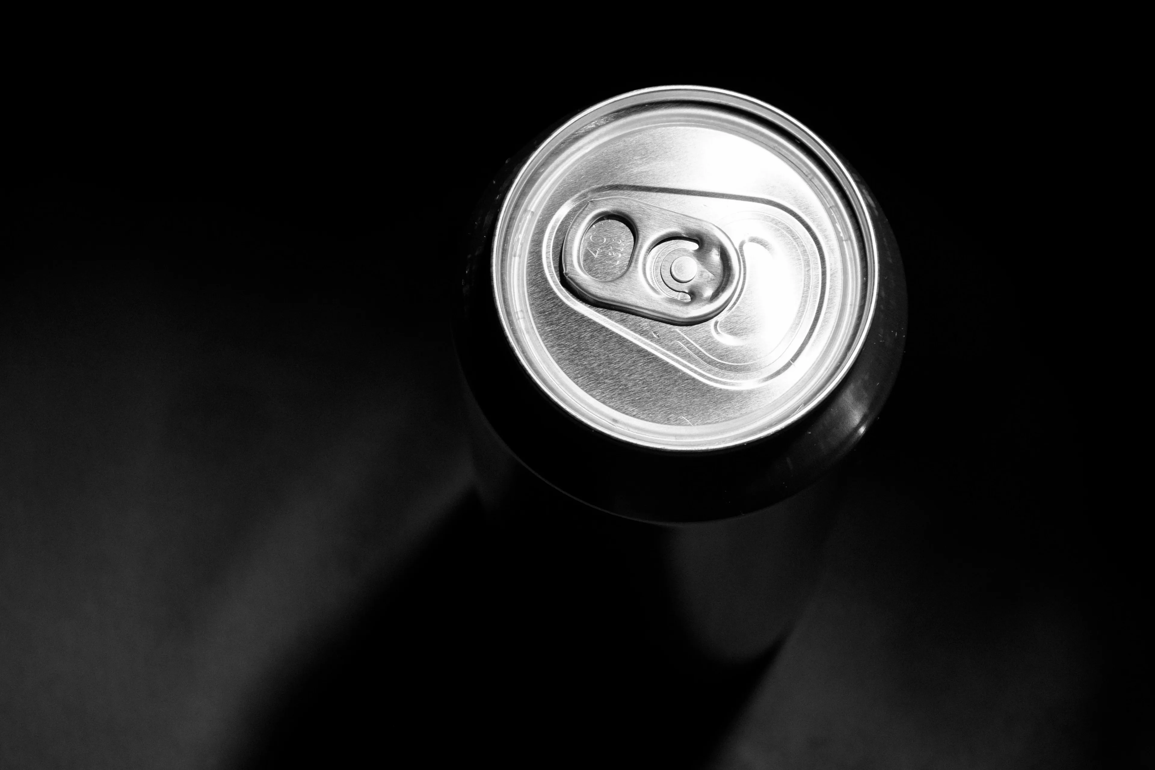 American vs English words quiz showing a close-up of a soda can, asking what an American calls this.
