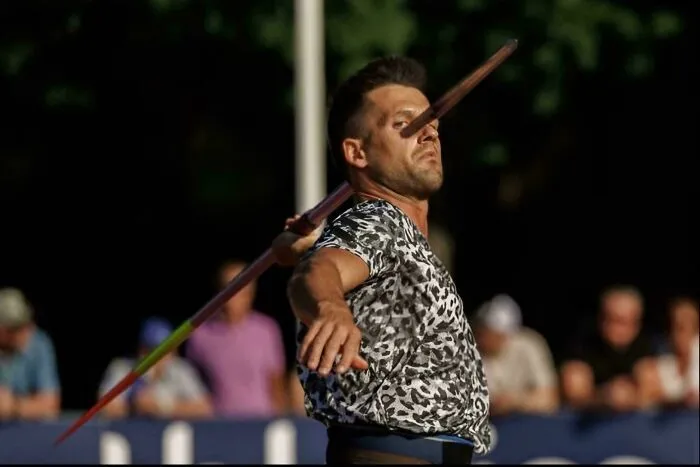 Real photos of a javelin thrower with the javelin appearing to go through his eye, making you question if it was edited.