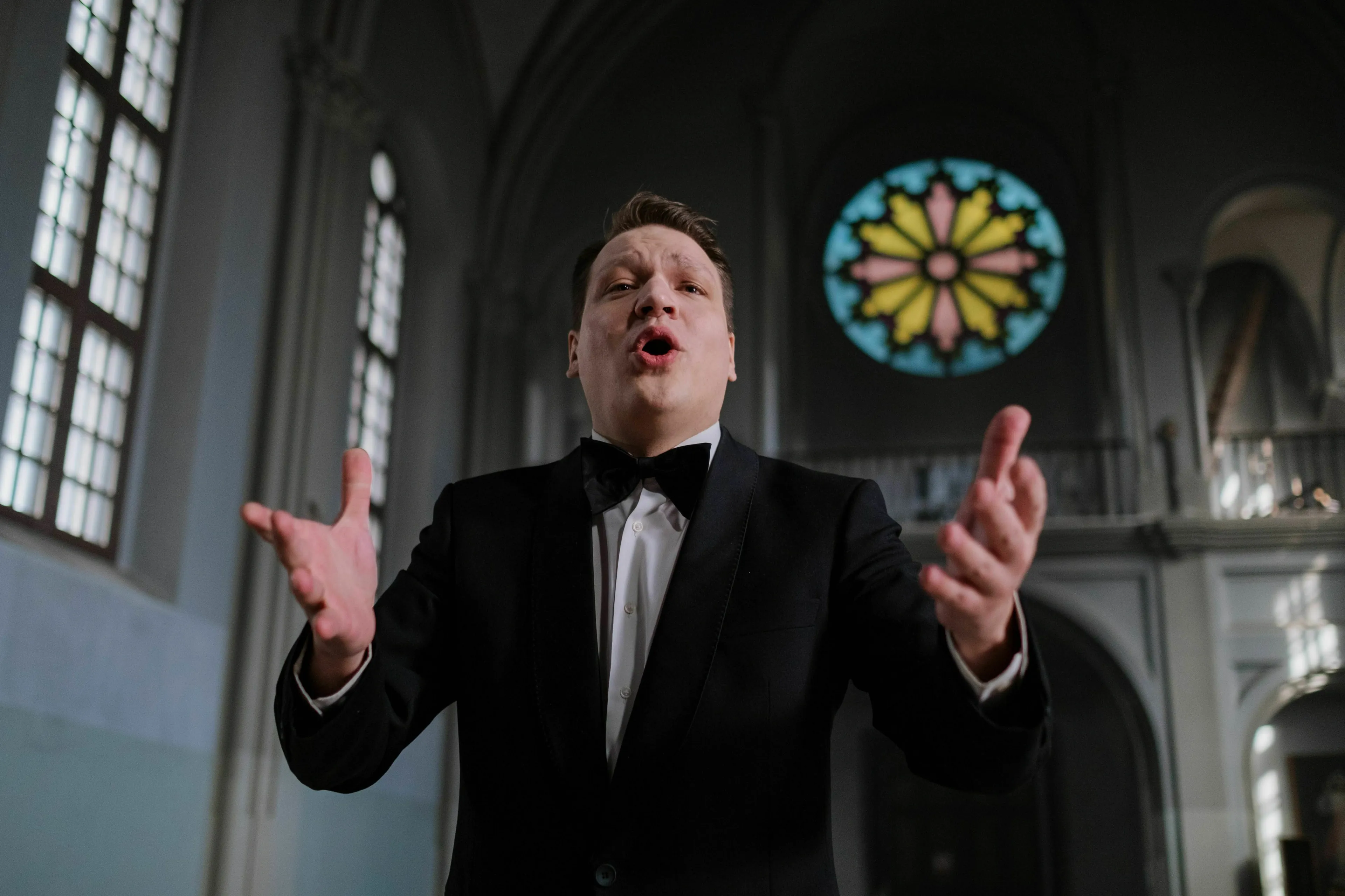 Classical Music Quiz: a male opera singer performing an aria in an ornate hall, like Figaro! Figaro! Figaro!