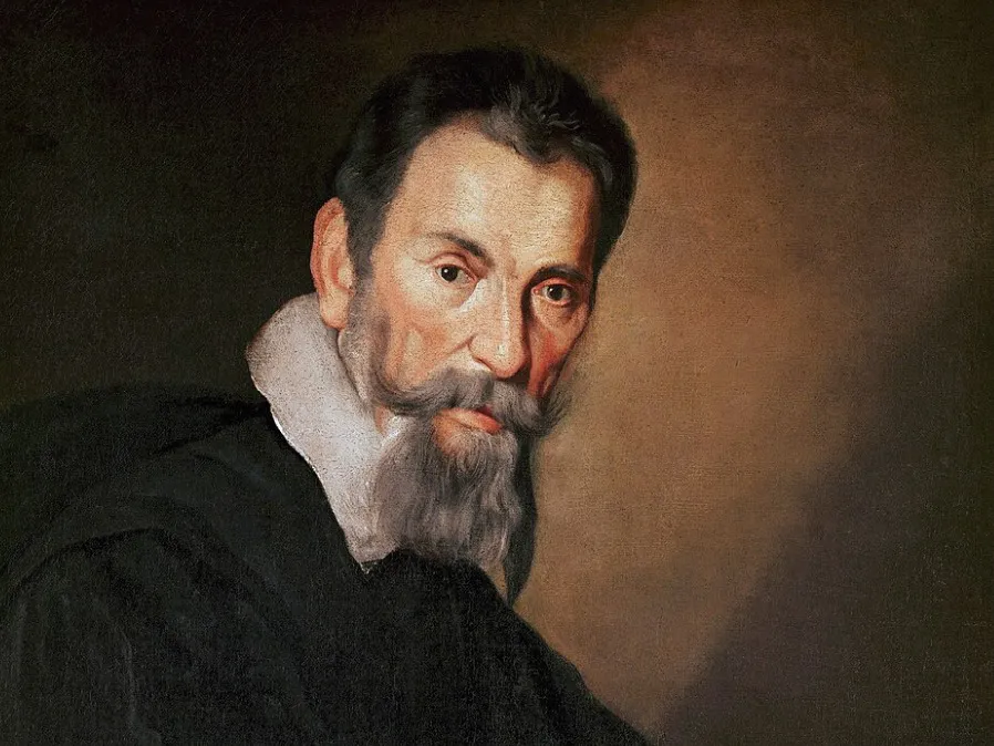 Claudio Monteverdi, a famous Italian Baroque composer, portrayed in a detailed oil painting with a white collar and beard.