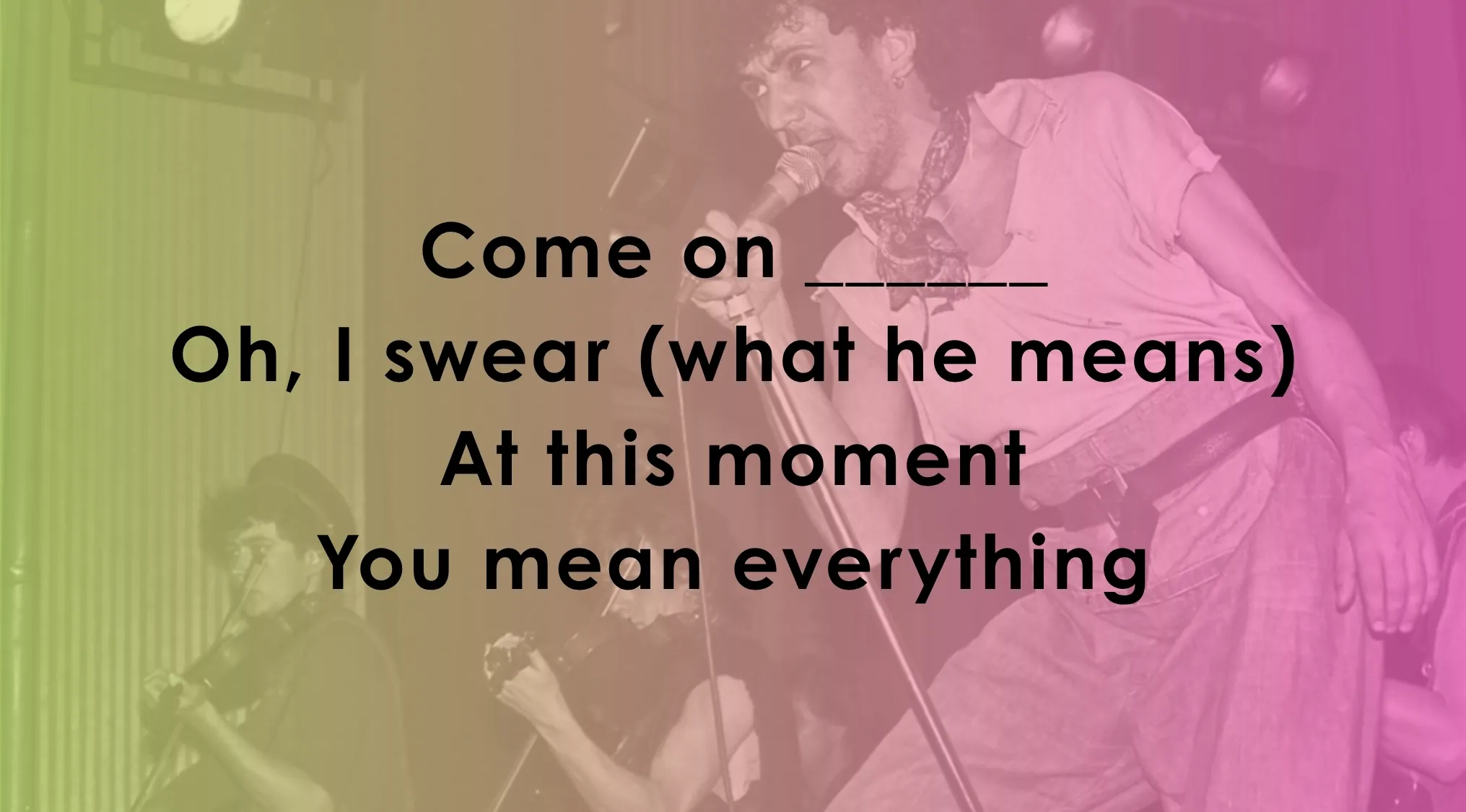 Image of a singer on stage, used for a music lyrics quiz asking to finish the song line.