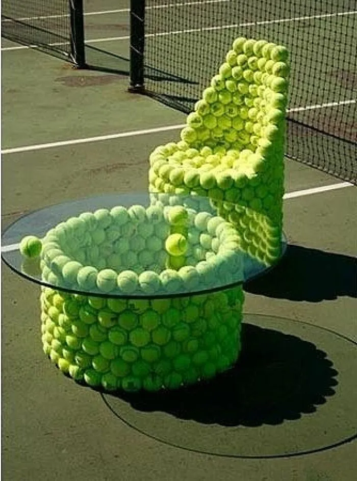 A chair and table made from tennis balls, a crazy furniture design.