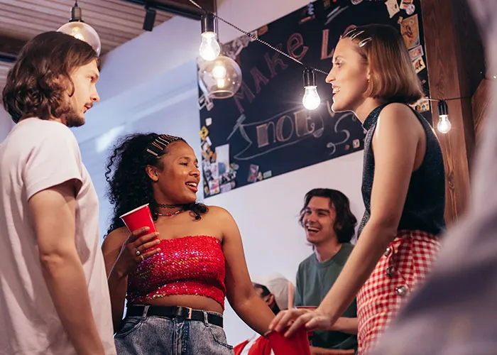 Friends enjoying a party, a common scene that slowly stopped for newer generations.