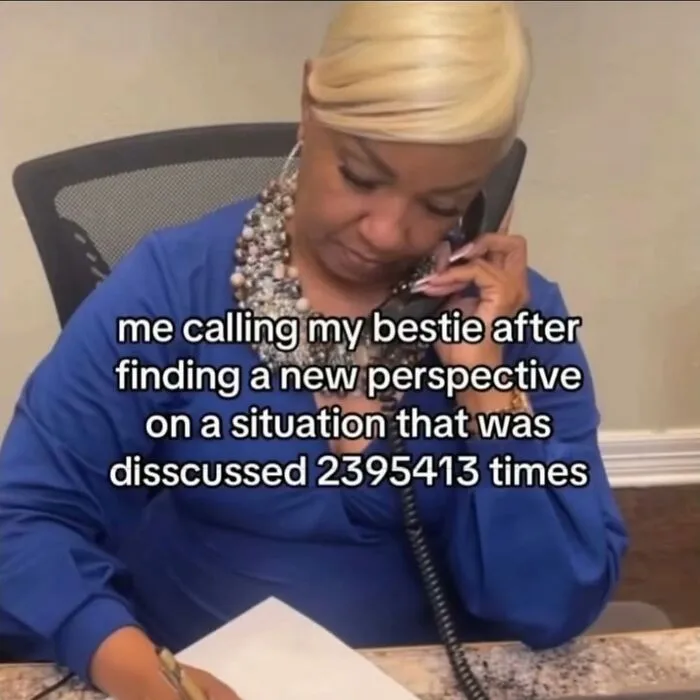 A woman on the phone, engaging in a relatable meme about endlessly discussing a situation with a best friend.