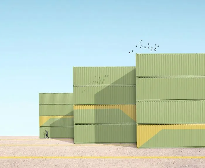 Minimalist color photo with a person walking past tall green shipping containers, capturing the world.