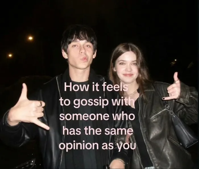 A young man and woman striking poses, a hilarious meme about gossiping with someone who shares your opinion.