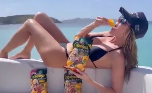 Heidi Klum Sparks Fresh Backlash After Promoting Potato Chips In A Thong Bikini: "Put Some Clothes On"