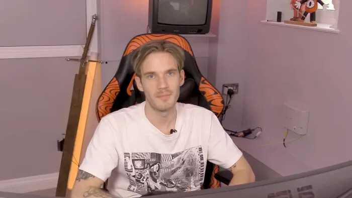 Man sitting in a chair, reflecting on timeline facts and changing sense of history.