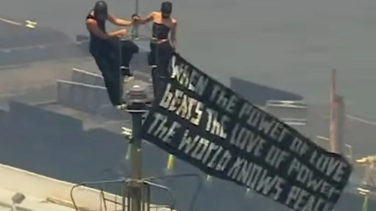 Empire State Building Daredevils Expose Security Lapse After Scaling 1,454-Foot Antenna To Hang "Cringe" Flag