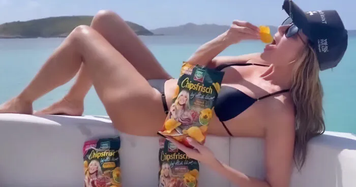 Heidi Klum Sparks Fresh Backlash After Promoting Potato Chips In A Thong Bikini: "Put Some Clothes On"
