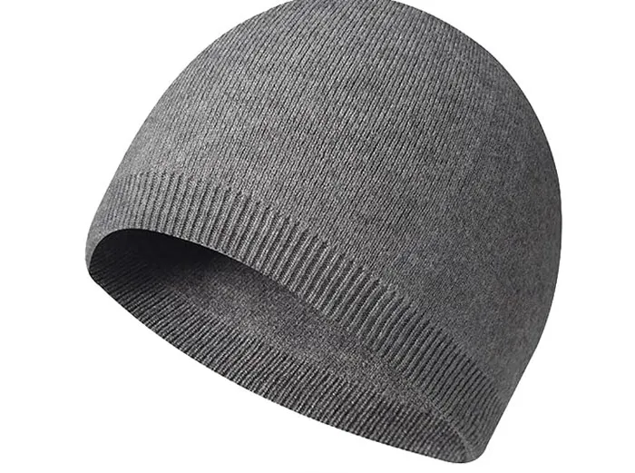 A grey beanie hat, symbolizing everyday cultural differences or personal styles within intercultural relationships.