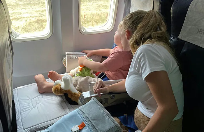 Entitled Mom Demands Plane Seatmate Hands Over Their Free Coke To Unruly Son, Gets A Reality Check