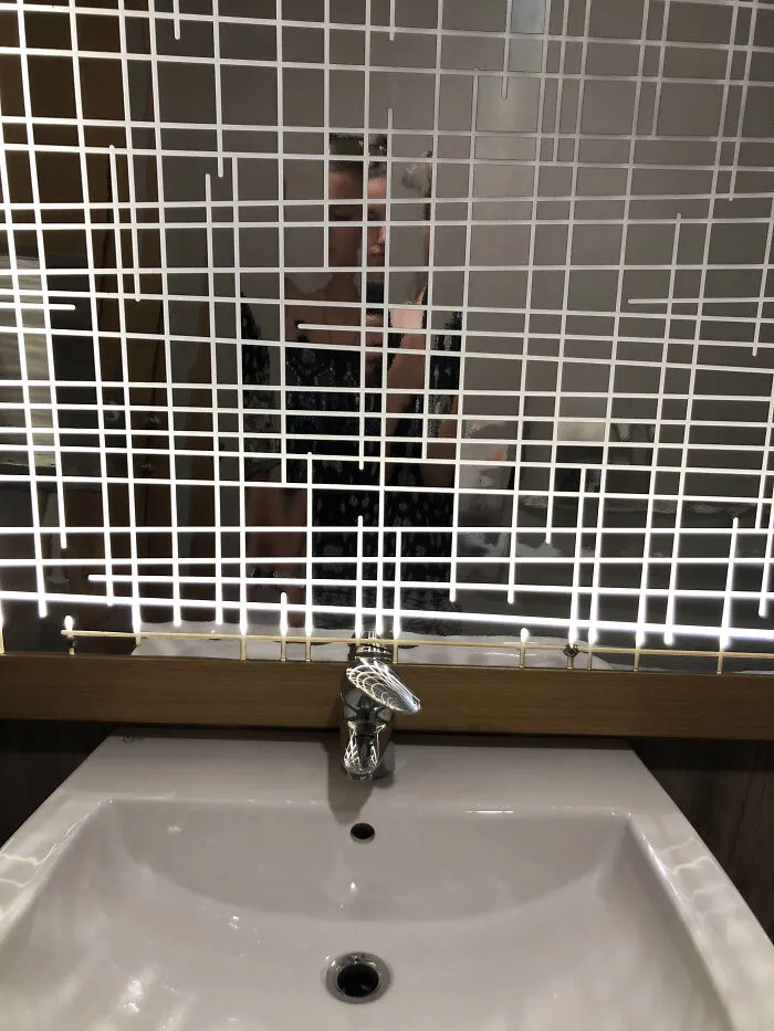 Bathroom Mirror At A Bar In Italy