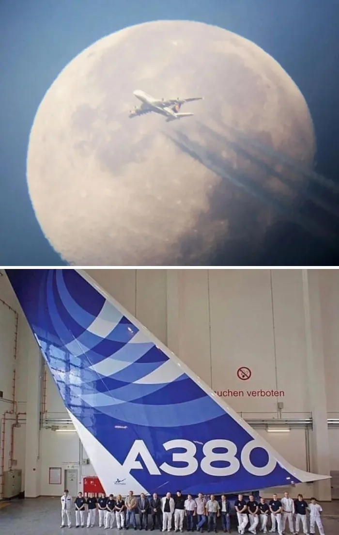 An A380 airplane flying in front of the moon and its massive tail fin, showcasing extremely large things.
