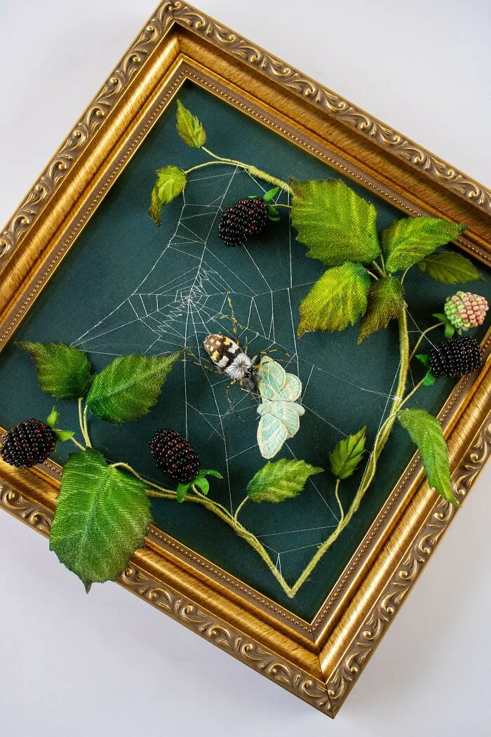 Stunning 3D embroidery projects of a spider, web, and blackberries in an ornate gold frame