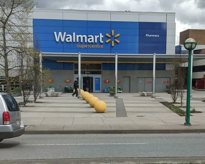 Former Target Turned Into A Walmart, They Painted The Target Orbs Yellow Instead Of Removing Them