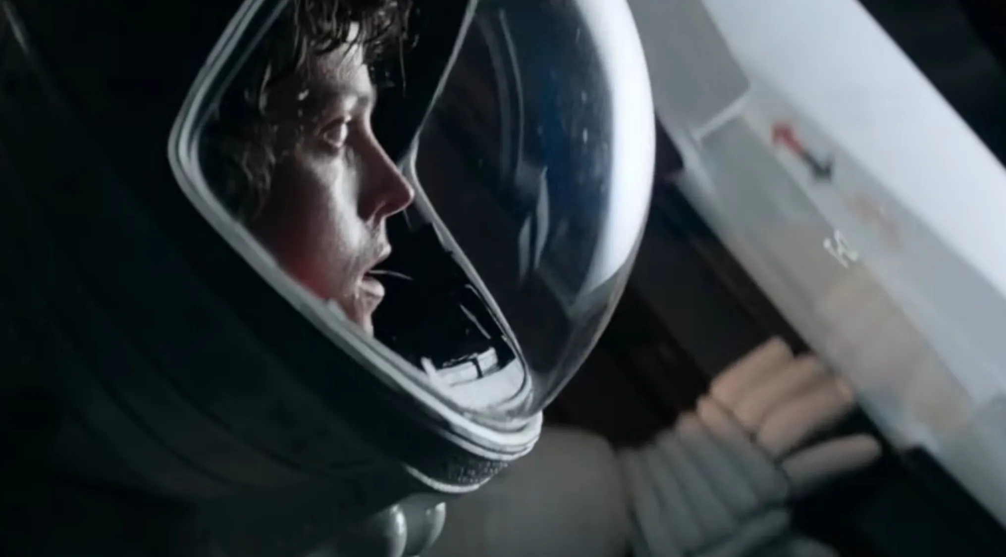 Ellen Ripley in a space helmet, a final scene from a movie.