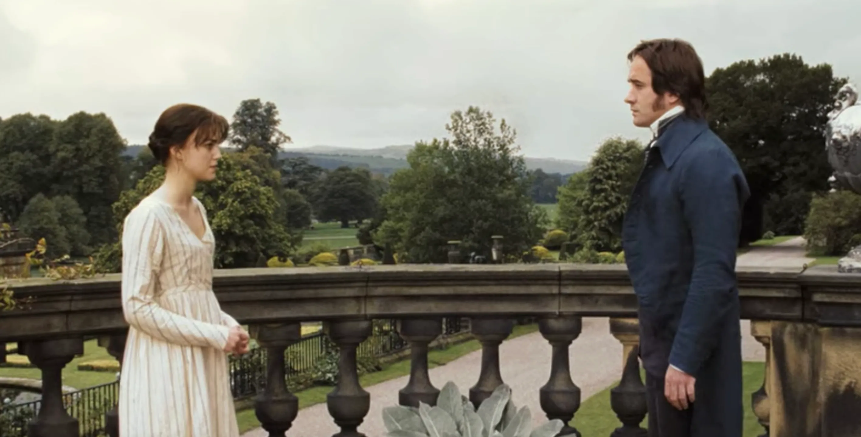 Elizabeth Bennet and Mr. Darcy from Pride and Prejudice on a balcony overlooking a garden, perfect for a general knowledge quiz.