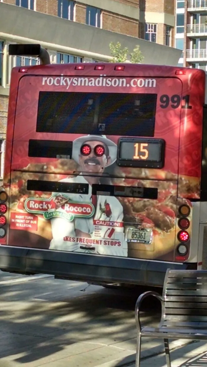 The Tail Light Placement On These Bus Ads Is Either Crappy Or Genius