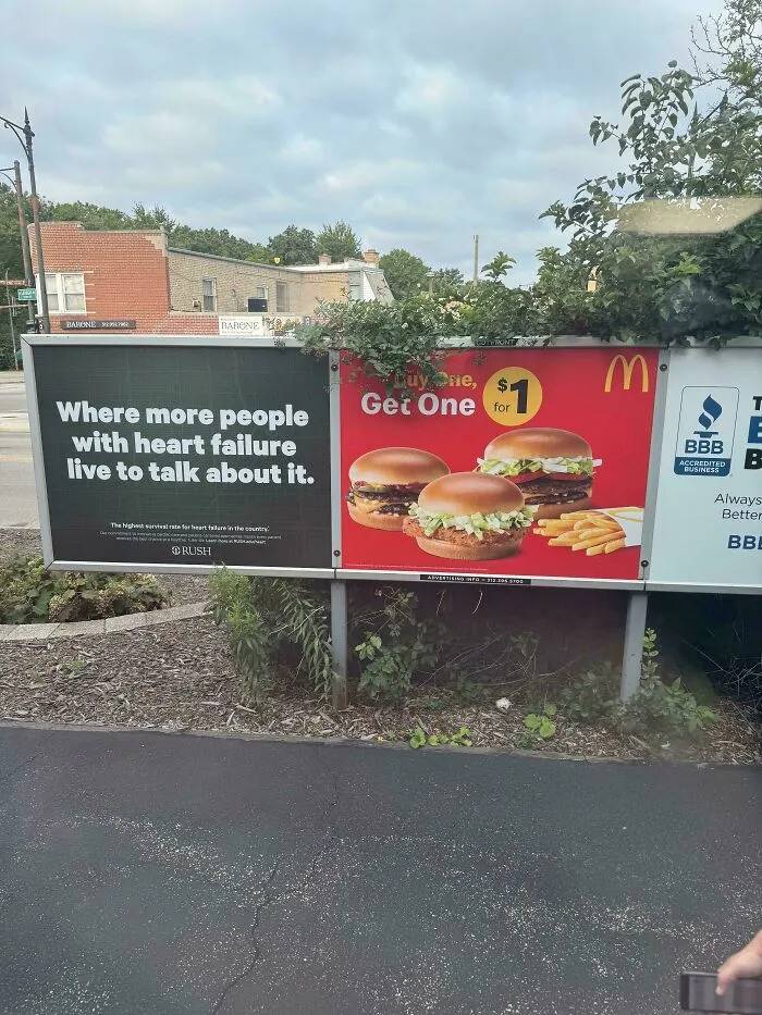 A medical ad about heart failure next to a McDonald's burger ad, creating hilarious ad placement.