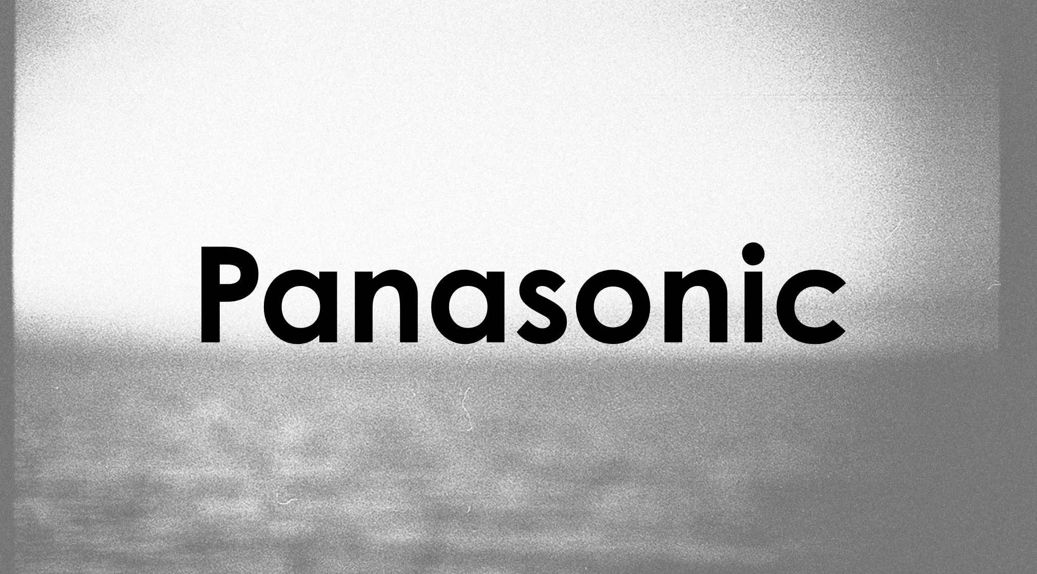 Black text Panasonic on a grainy black and white background. Guess the book based on the original title clue.