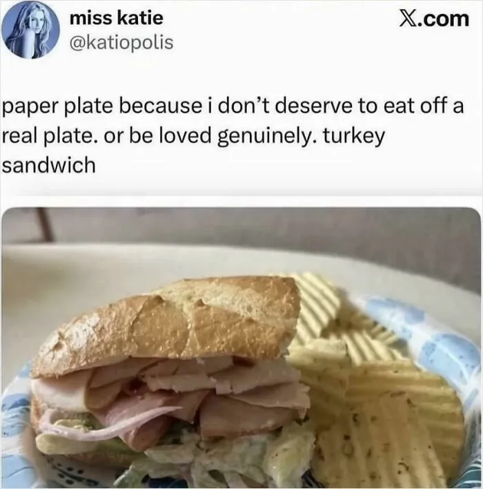 A tweet sharing unhinged thoughts about eating a turkey sandwich on a paper plate, emphasizing feelings of not deserving love.